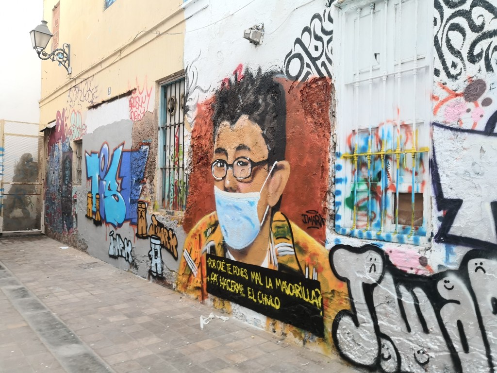 Mural del chaval chulo, obra de J.Warx, en Benimaclet